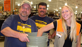 Mike & Ralph get a little help from Kate drawing  the winning ticket